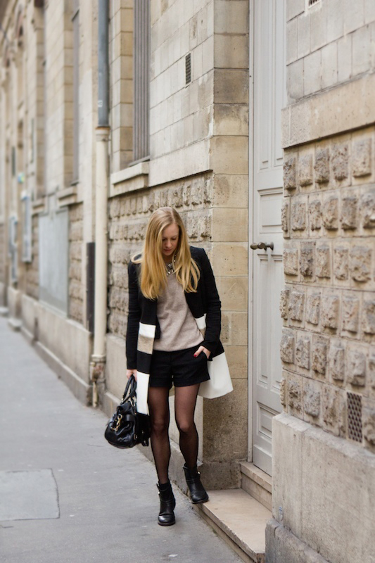 Black gold and white coat out in Le Marais
